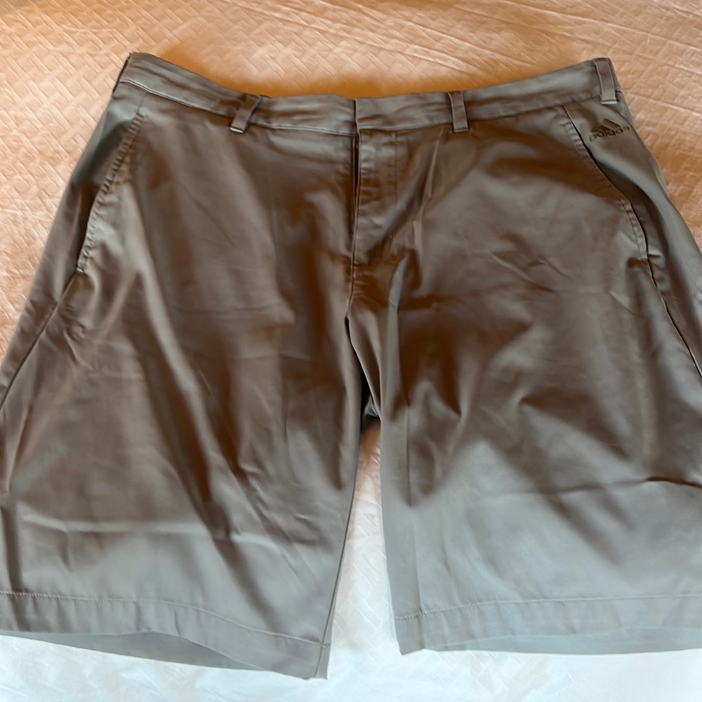 Addidas grey shorts size 34 .